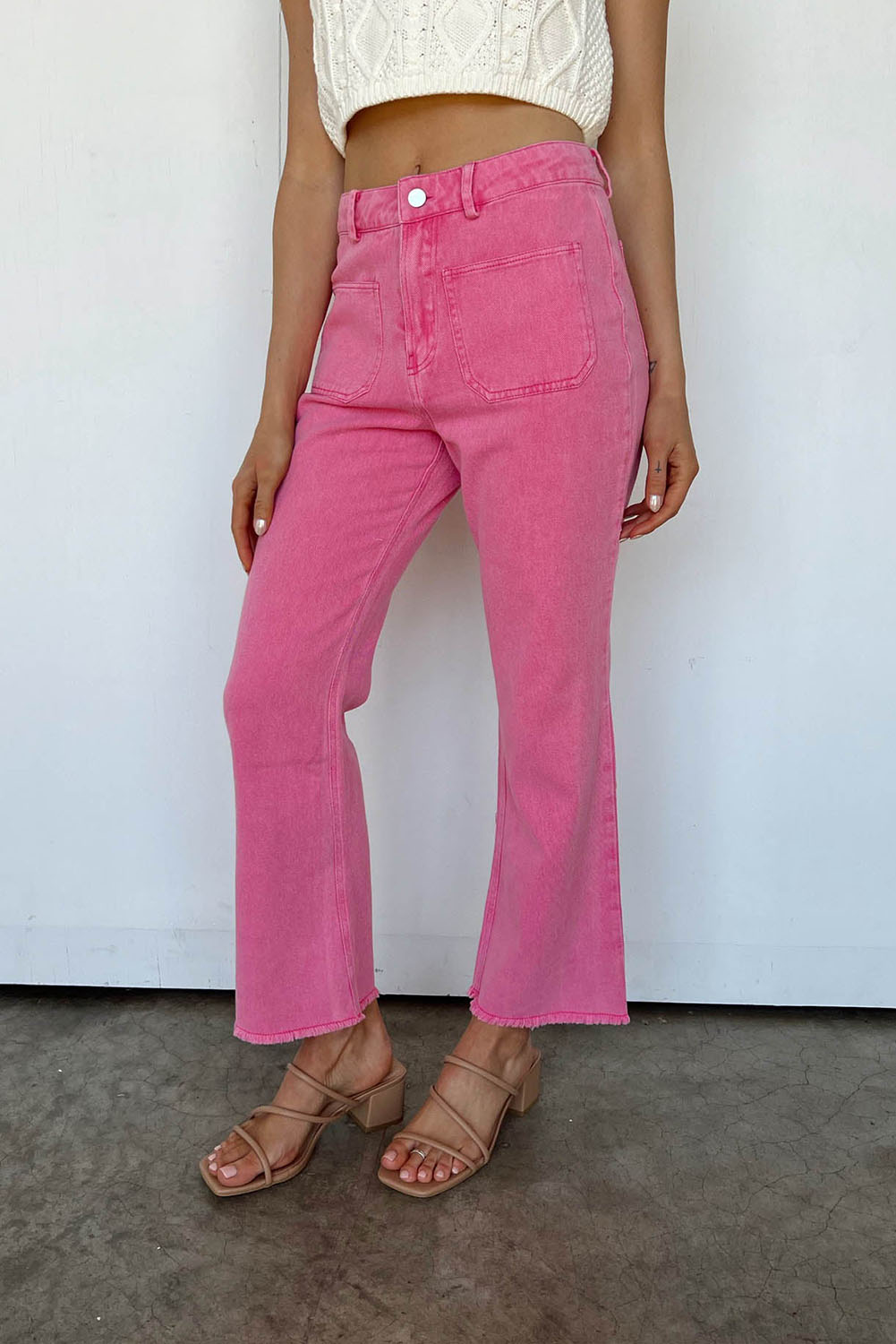 Pink Flare Leg Raw Hem Jeans